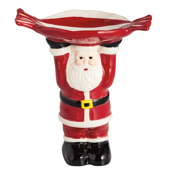 Ceramic Santa Claus pedestal dish holding a red and white striped candy-shaped bowl overhead.