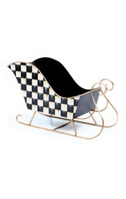 Courtly Check medium tin sleigh with black and white checkered pattern and gold-tone metal runners.