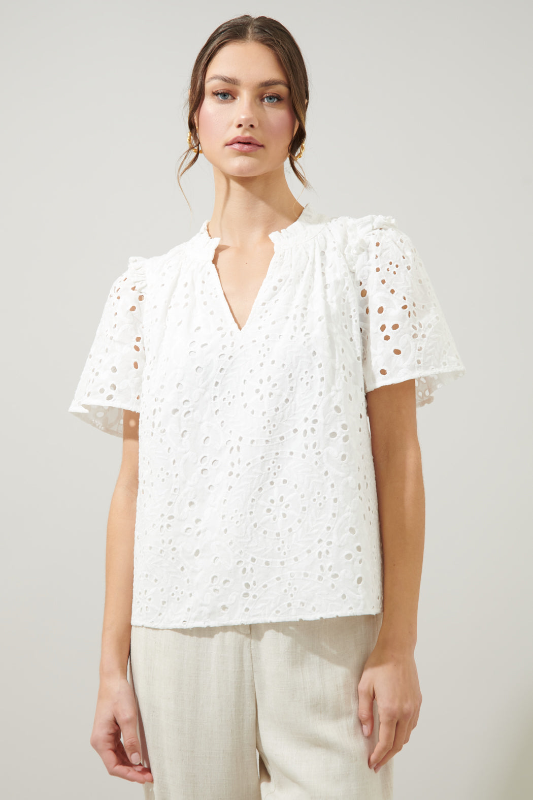 Faye Rain or Shine Eyelet Top in white cotton with a split neckline.