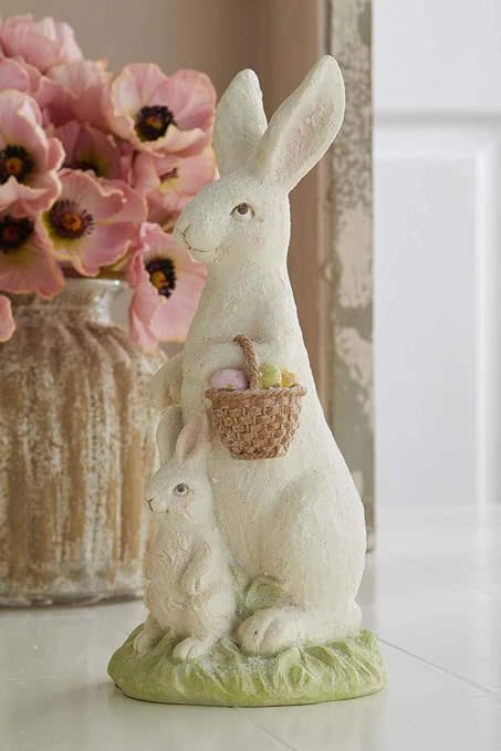 White resin bunny figurine with glitter finish standing on a flat base.
