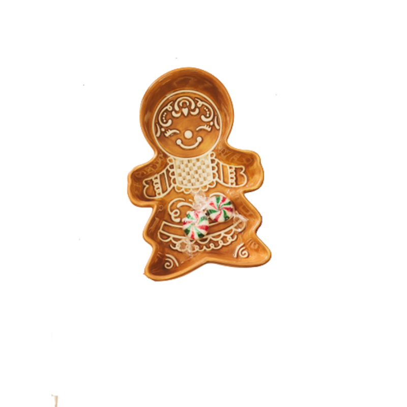 Mocha gingerbread girl snack bowl with white check and swirl details holding two peppermint candies.