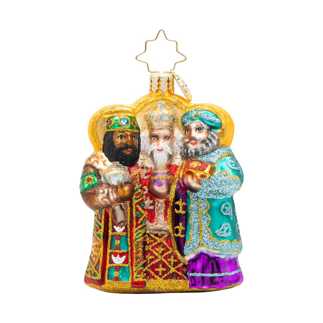 Journey of the Wise Men glass ornament featuring the Three Kings in colorful, glittered robes.
