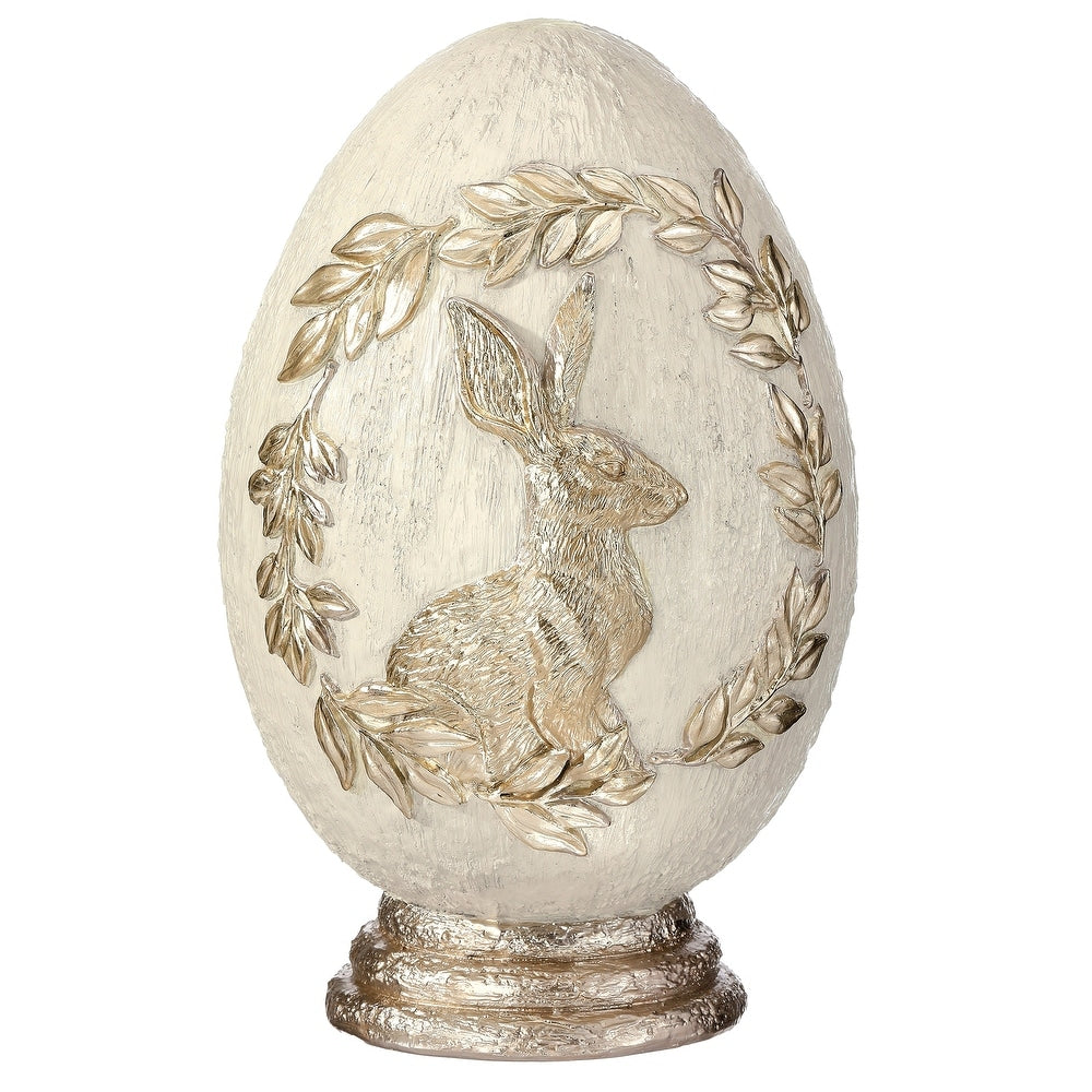 8.5-inch resin decorative egg with bunny motif in royal blue