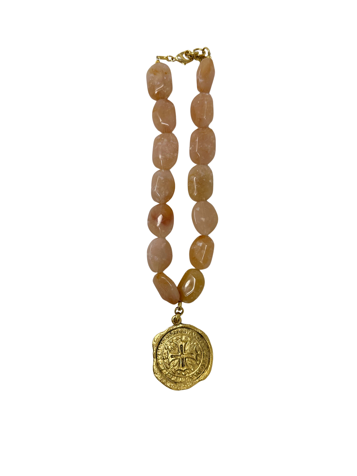 Rose quartz bead necklace featuring a gold cross coin pendant and lobster clasp.