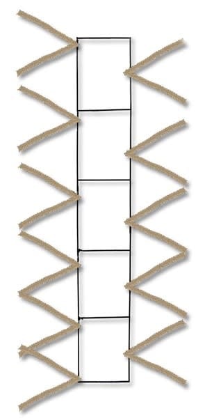 Vertical wire work pencil rail measuring 22 inches long by 4 inches wide.