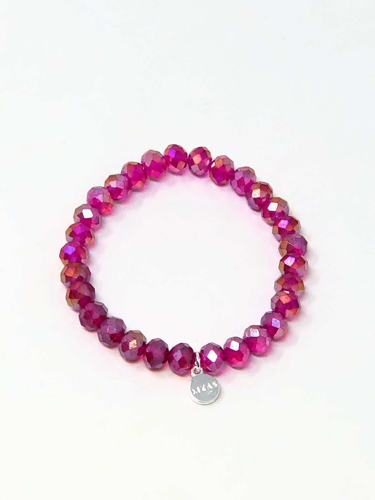 Stretchy bracelet with faceted glass beads in a colorful beaded pattern.