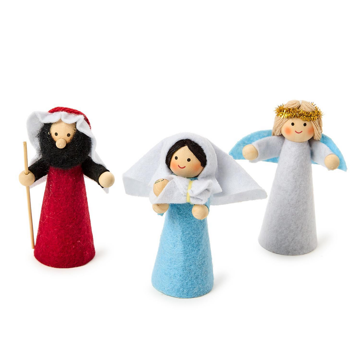 Three handcrafted felt nativity figures: Joseph with a staff, Mary with Baby Jesus, and an angel.