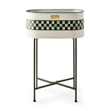 Galvanized metal standing planter with a tall rectangular silhouette.