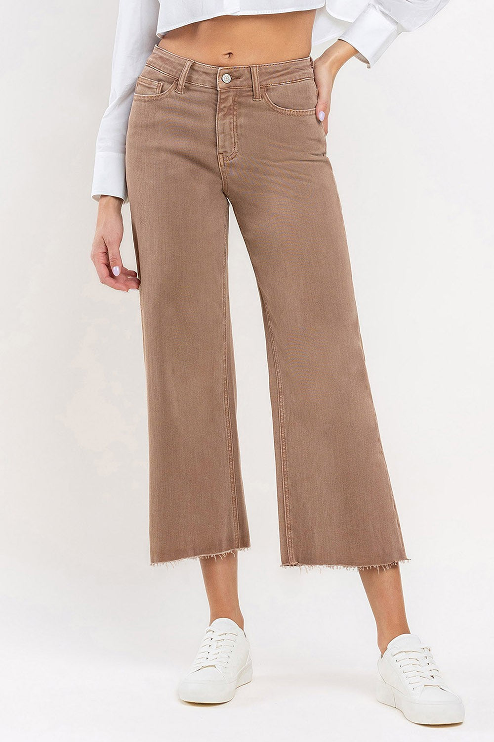 Stella high rise wide leg jeans in comfort stretch denim with raw hem.