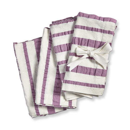 Set of four lavender and white seersucker striped napkins tied with a white ribbon.