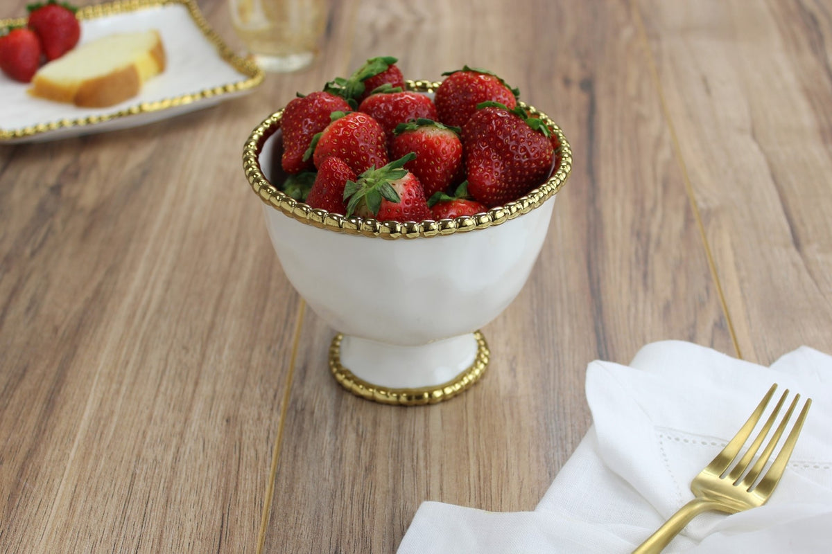 Small white porcelain bowl with gold titanium beading detail