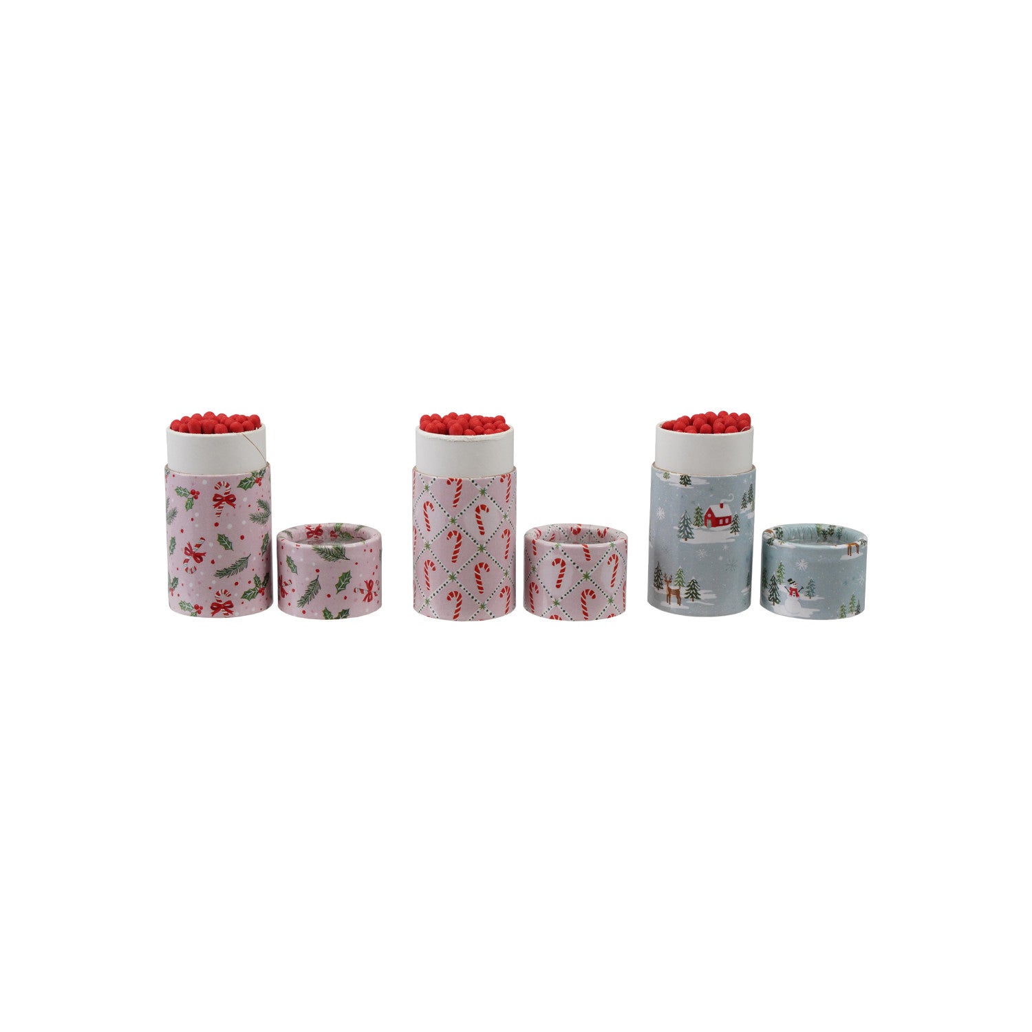 Three sets of holiday-patterned safety match tubes with red-tipped matches and matching caps.