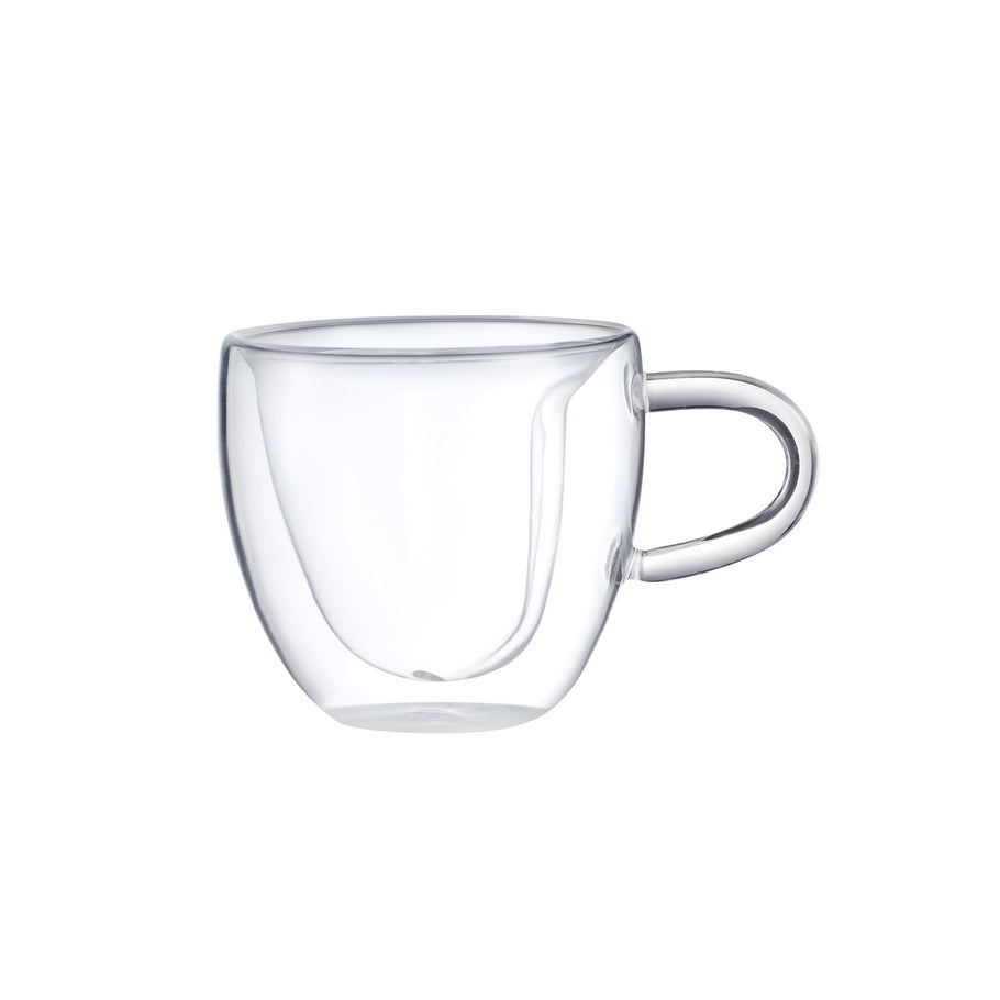 Double walled clear glass espresso cup with a heart-shaped inner wall and side handle.