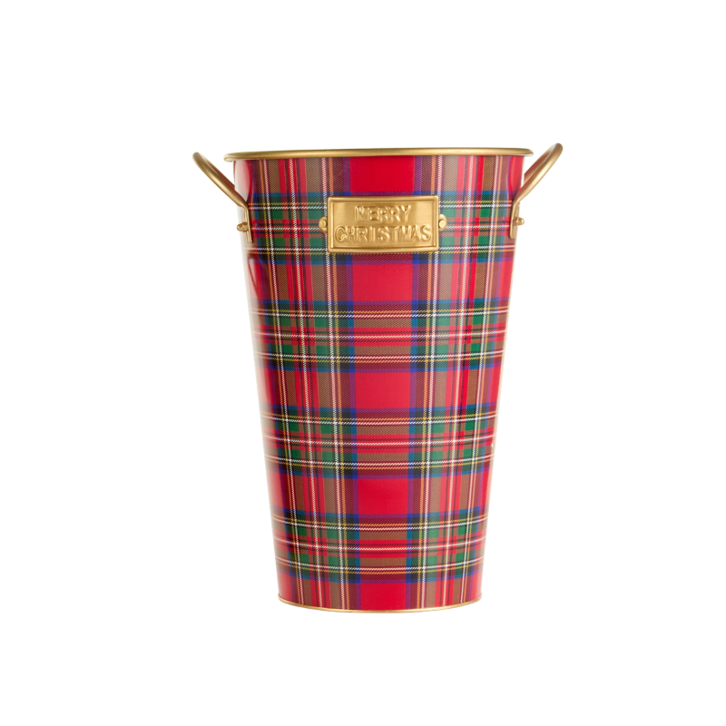 Red, green, and gold plaid iron bucket with gold handles and a 'Merry Christmas' plaque.