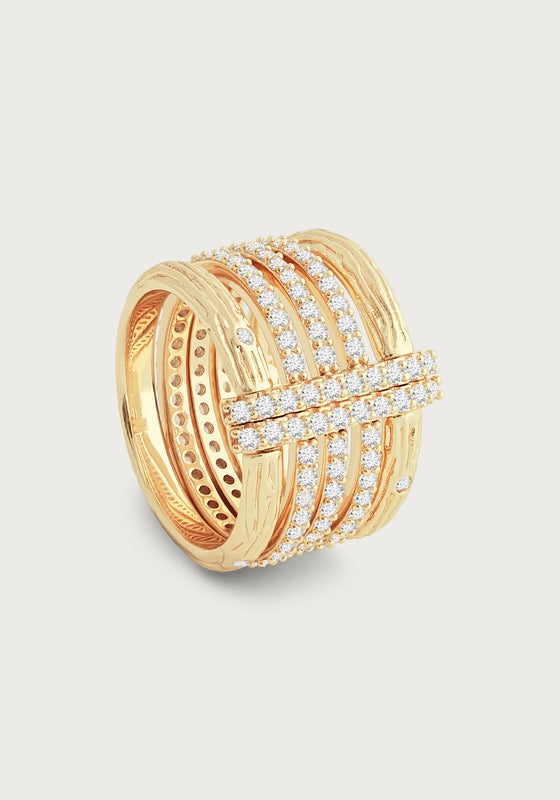 Gold-plated multi-stack ring with woodgrain texture and hand-set pavé crystal bands.