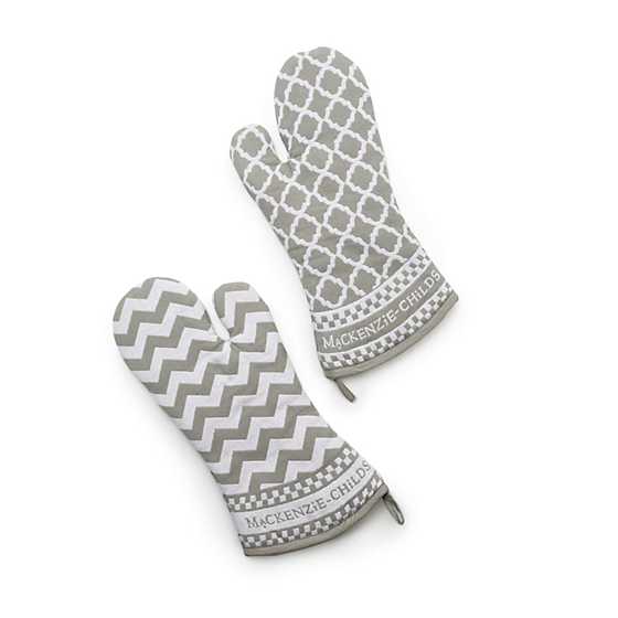 Sterling cotton zig zag oven mitts with a wide rectangular silhouette.