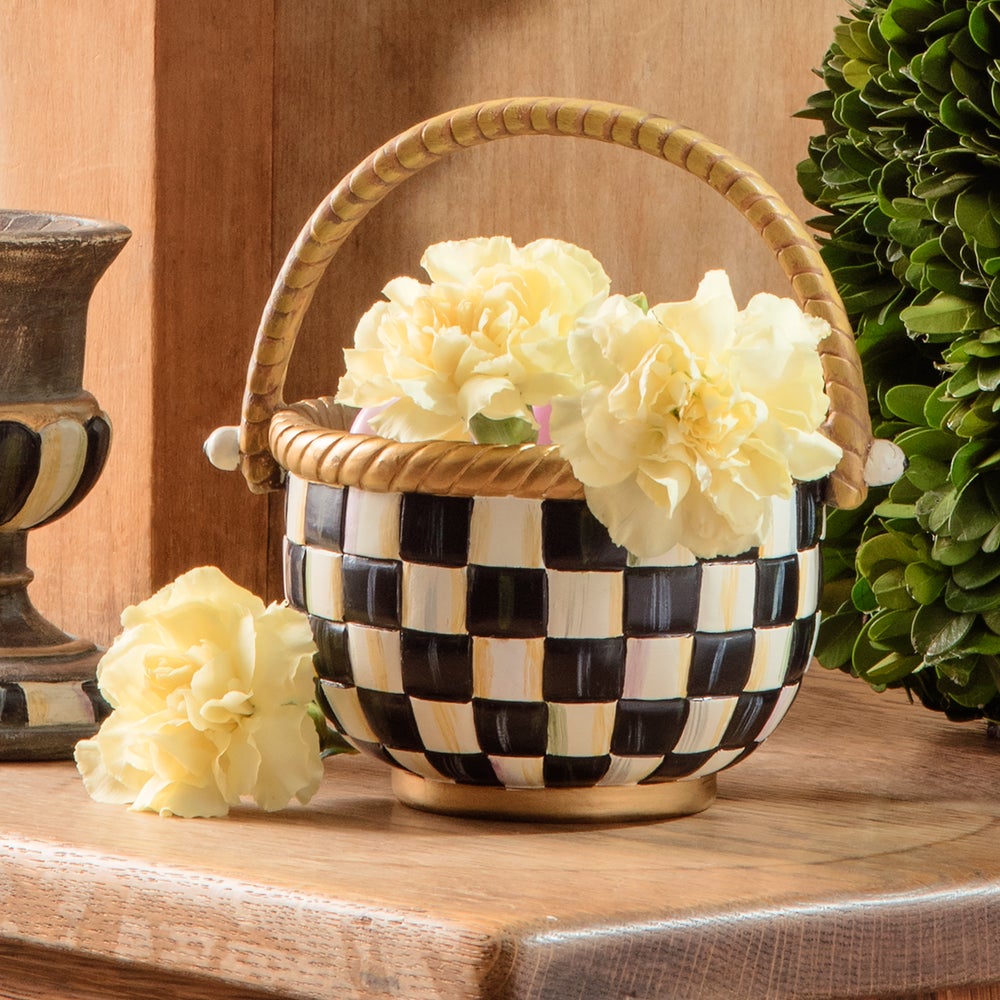 Courtly Check Small Basket made of resin with a black and white checkered pattern and gold handle.