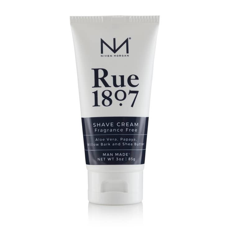 Rue 1807 Shave Cream in a white cylindrical container with black text labeling.