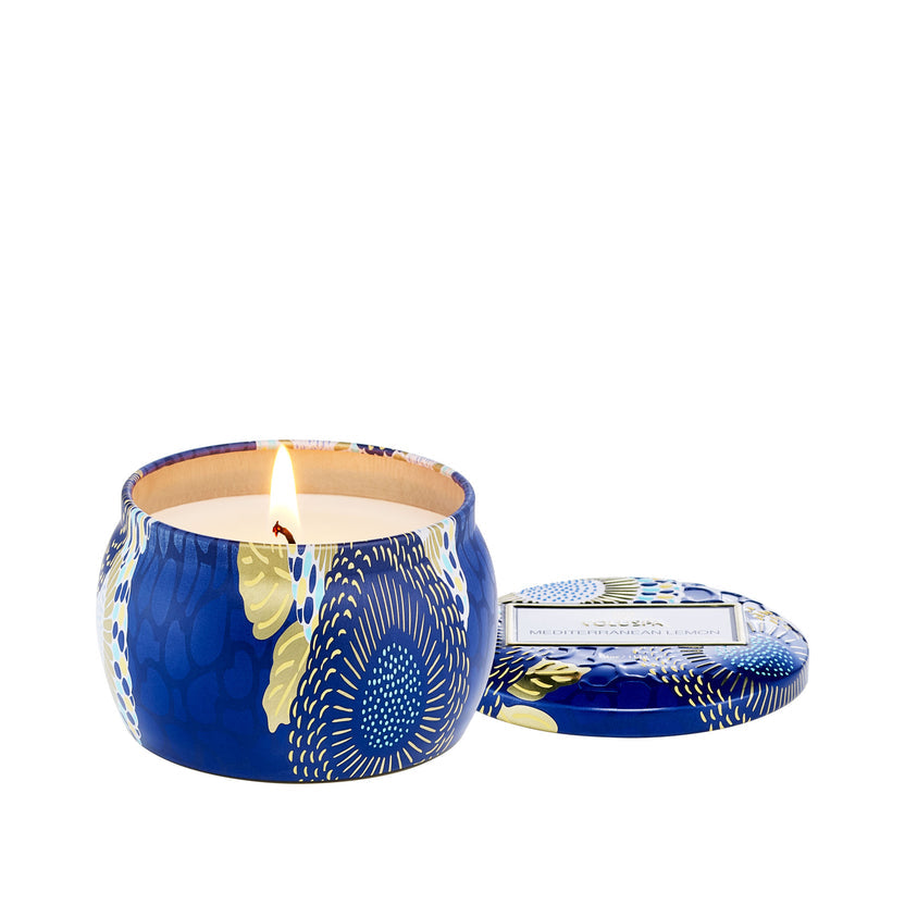 Mediterranean Lemon Mini Tin candle in a small cylindrical glass jar with white wax and natural wick.