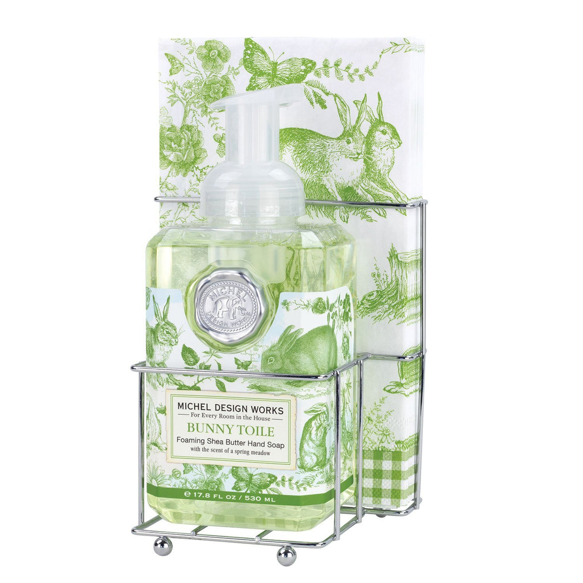 Compact foaming hand soap dispenser with matching napkin holder in neutral tones.
