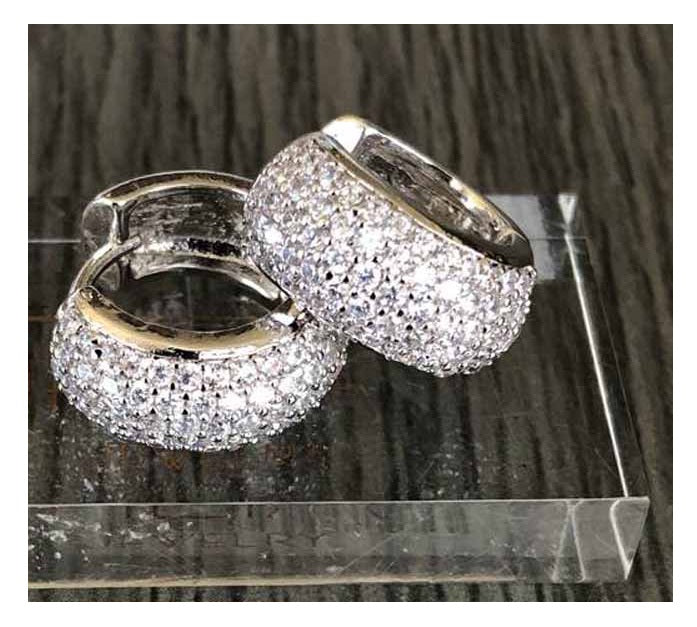 Five Row Medium Huggie Earrings with high-quality cubic zirconia stones on pierced posts.