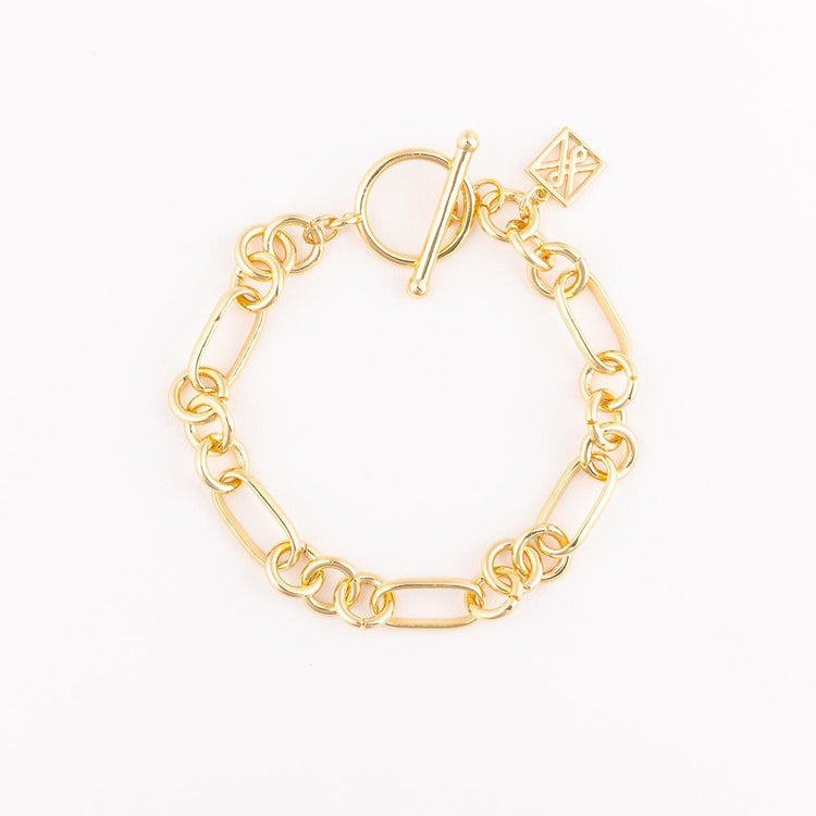 Nyla Bracelet: 18k gold plated open circle and oval link chain with a toggle clasp.