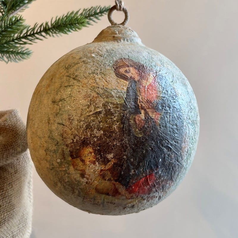Large metal Madonna and Child ornament with a classic religious silhouette measuring six inches.