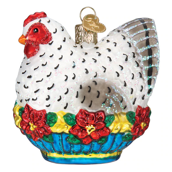 Glass French hen ornament in red with gold accents depicting a rooster.