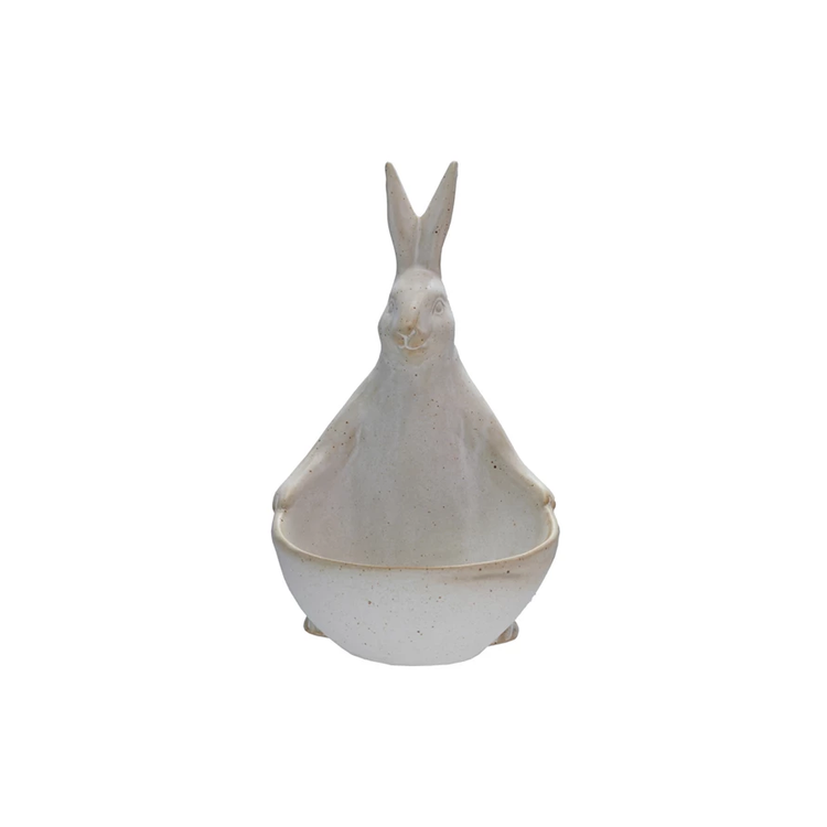 Speckled stoneware rabbit figurine holding a small bowl or planter.