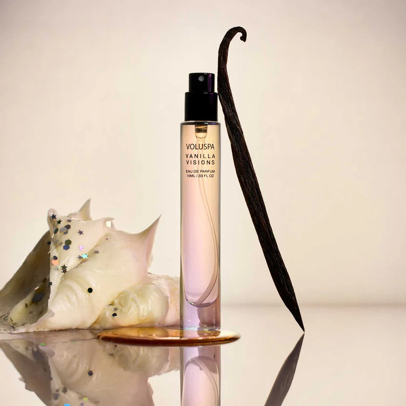 A small glass bottle containing Vanilla Visions Eau De Parfum with a sugared vanilla and amber scent.