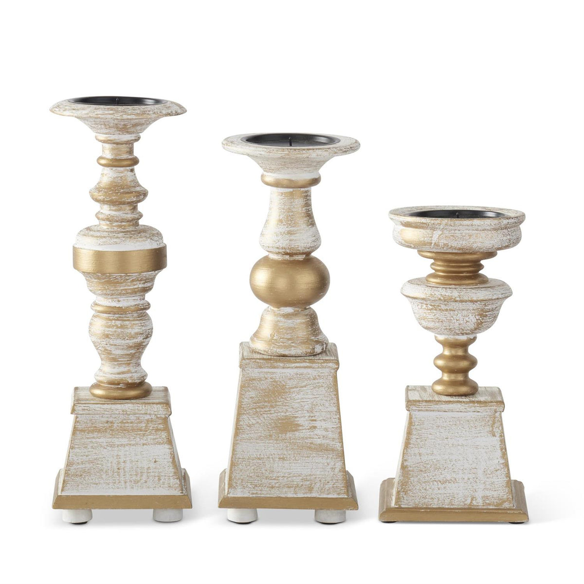 Two whitewashed wood candleholders with gold accents on a square base
