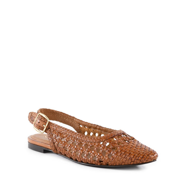 Avalon Flat sandal in almond leather with an adjustable buckle closure and open back silhouette.
