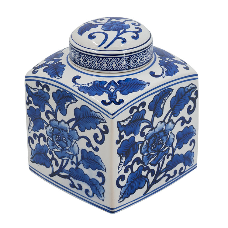 Square white ceramic canister with blue floral patterns and a matching round lid.