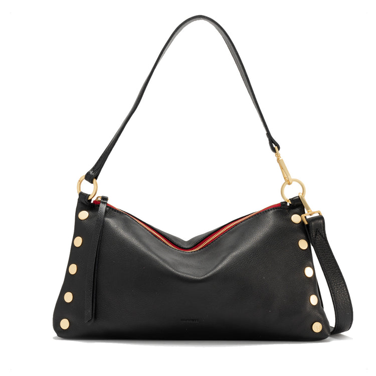 Black pebble leather crossbody bag with brushed gold hardware, red twill lining, and a zip closure.