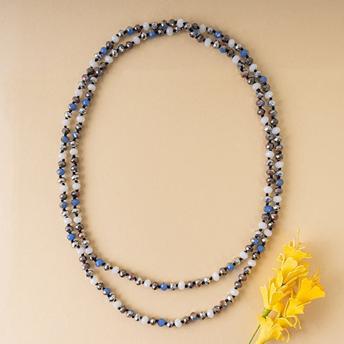 60-inch long necklace featuring clear crystal beads with a continuous strand design.