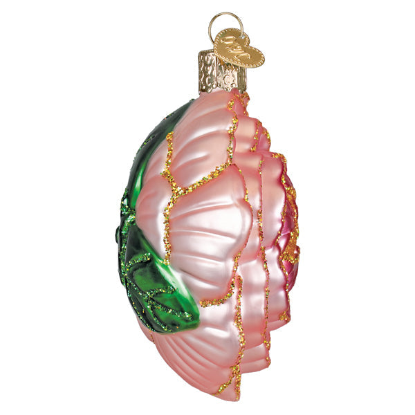 Pink glass peony flower Christmas ornament with gold glitter accents and green leaves.