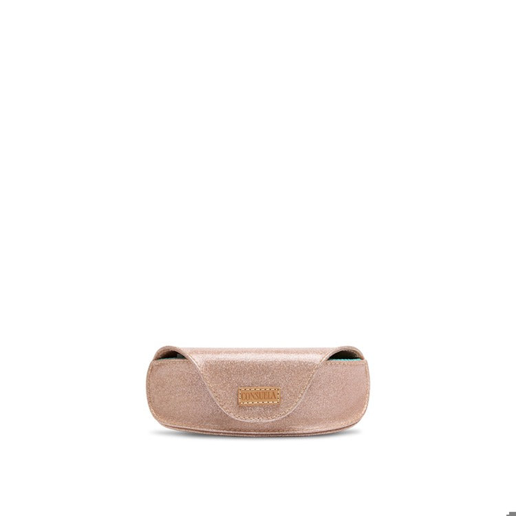 Emery sunglass case in a shimmering rose gold finish with a brown Consuela logo patch.