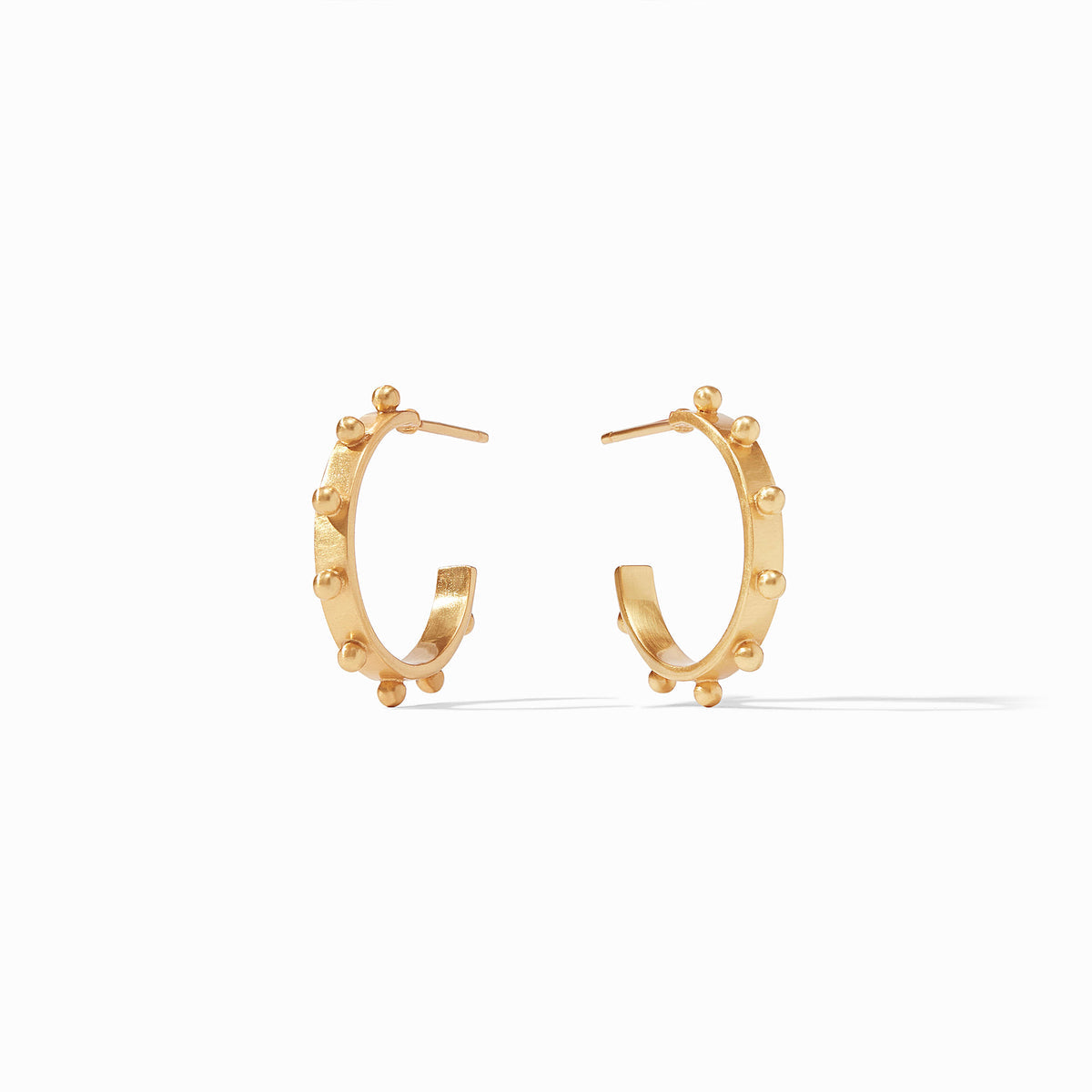 Gold-plated hoop earring with studded gold beads in a circular silhouette.