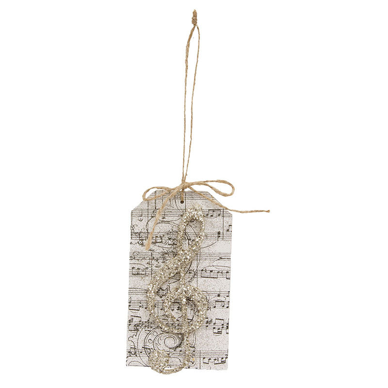 Glittered treble clef tag ornament in silver with a shiny finish.