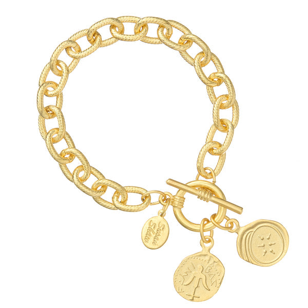 Gold toggle bracelet featuring a Widow's Mite charm with an open Bible silhouette.