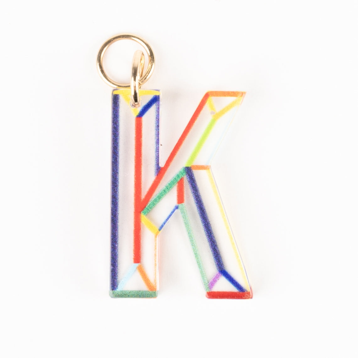 Clear acrylic letter K bag charm with colorful geometric lines and an 18K gold-plated ring.