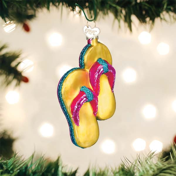 Yellow glass flip-flop ornament with silver interior and colorful painted glitters