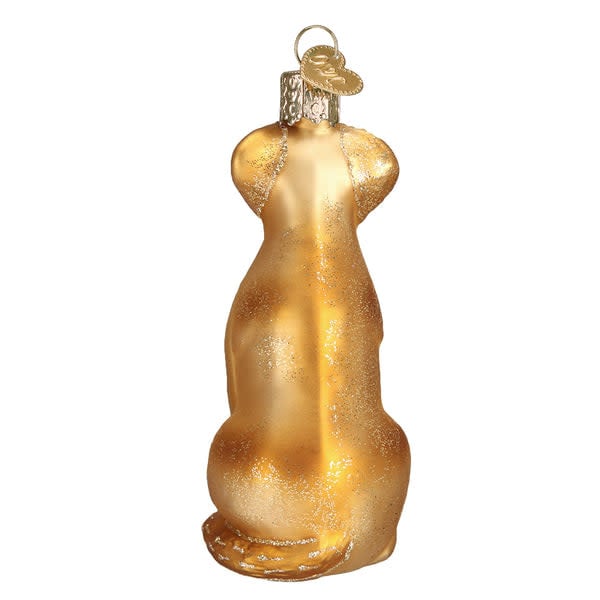 Yellow Labrador dog ornament with smooth glossy finish standing in a lifelike silhouette.