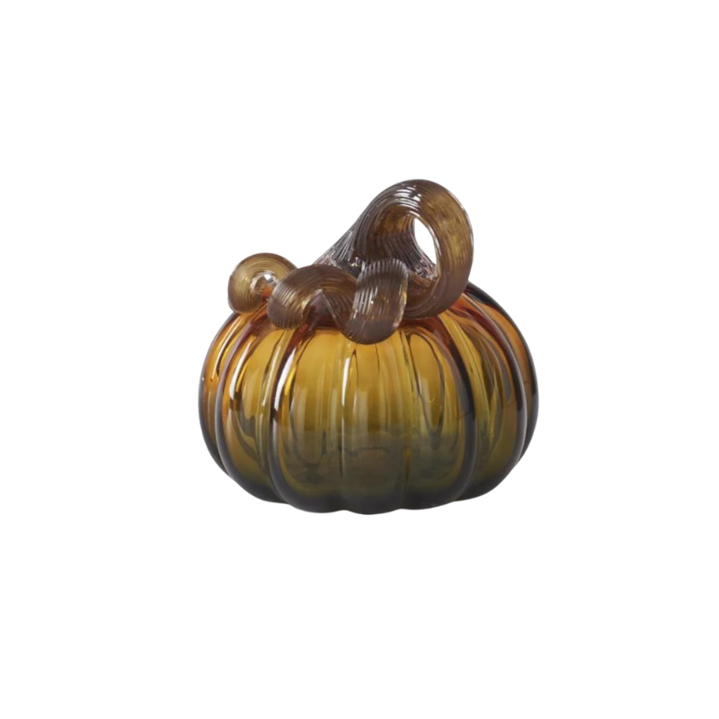 Green and amber handblown glass pumpkin with a curled brown stem.
