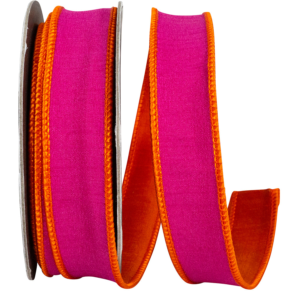 Pink and orange two-tone dupioni ribbon with a wired edge on a spool.
