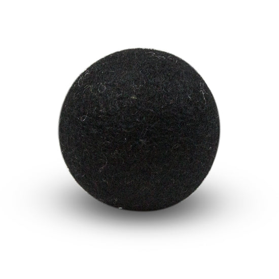 Single beige wool dryer ball with a smooth round shape.