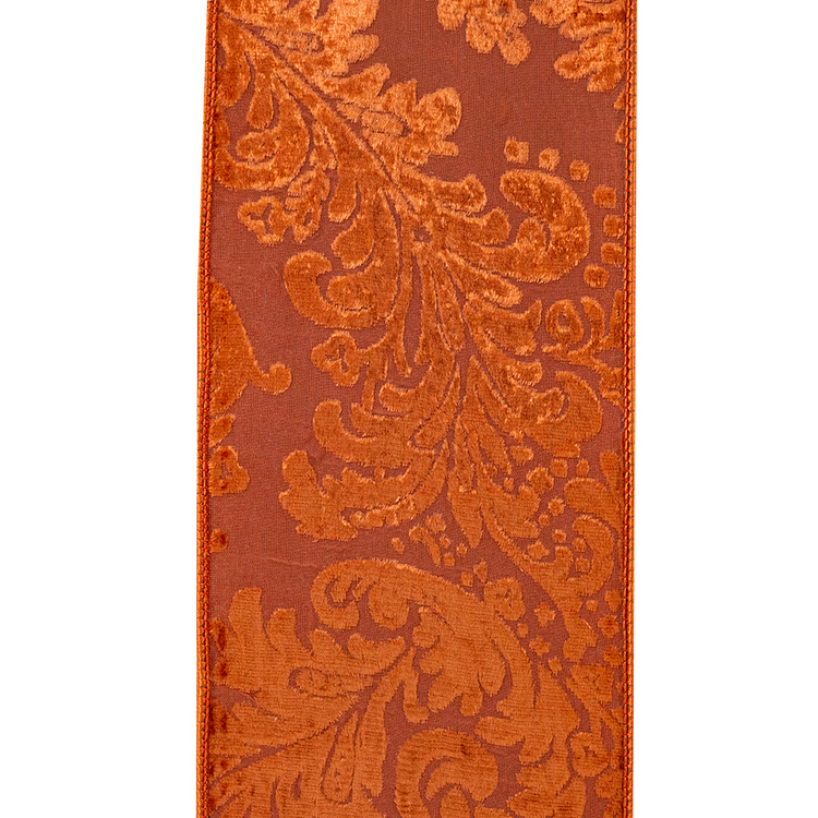 Copper velvet ribbon with a burnout filigree design and wired edges.