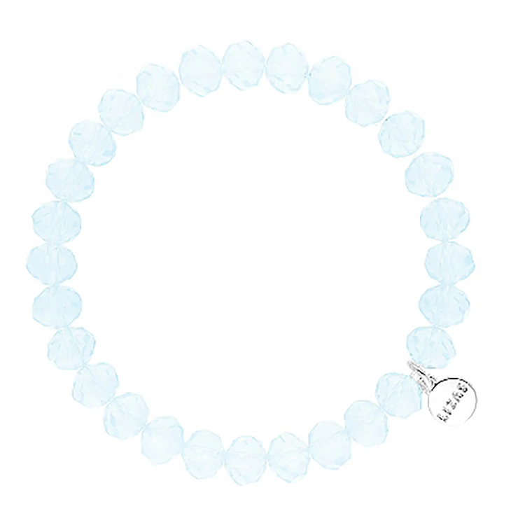 Lizas Quadro Big crystal stretch bracelet in light blue with a silver logo charm.