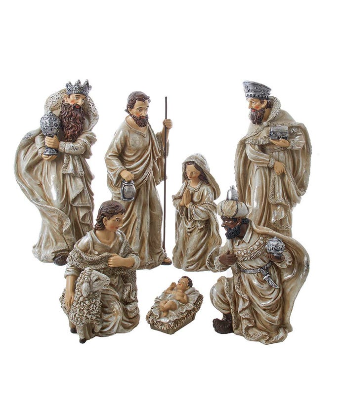 Seven-piece nativity table set featuring the Holy Family, Three Wise Men, and a shepherd.