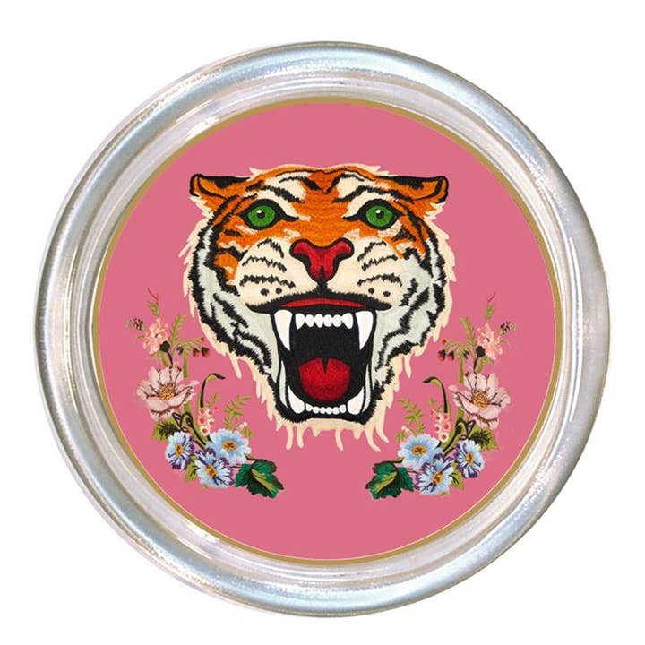 Glass coaster with a high rim to prevent spills, featuring a black velvet back.